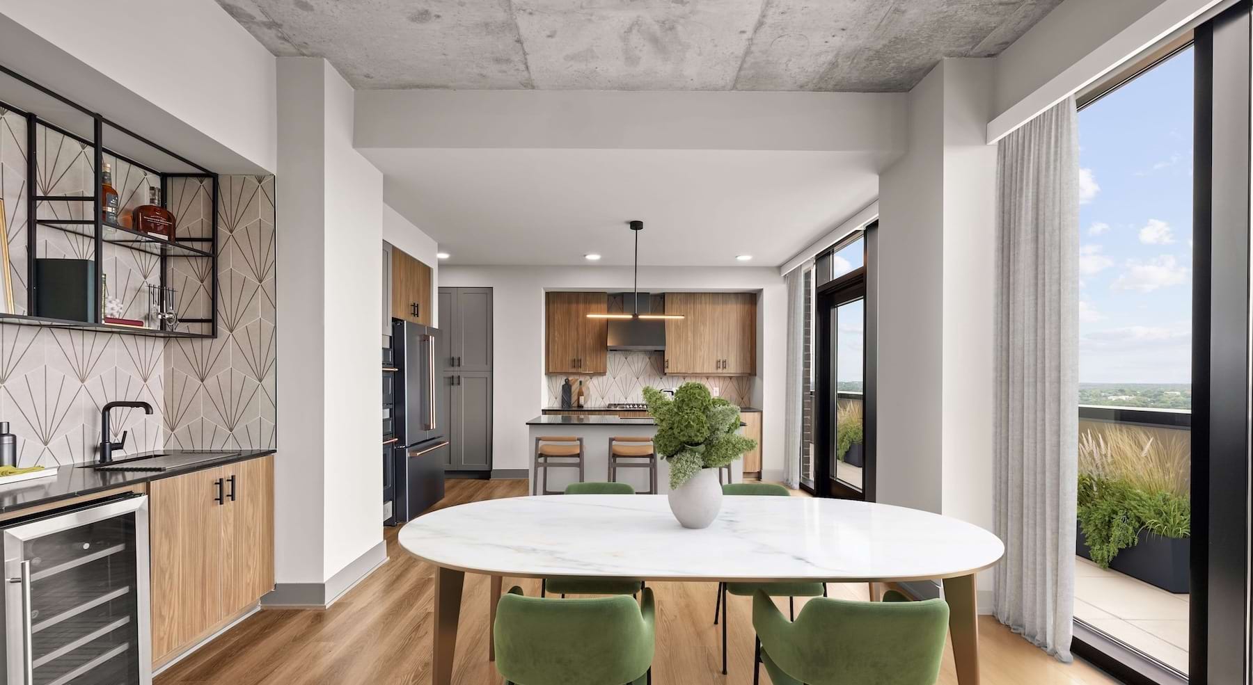 Kitchen with oversized windows and city views
